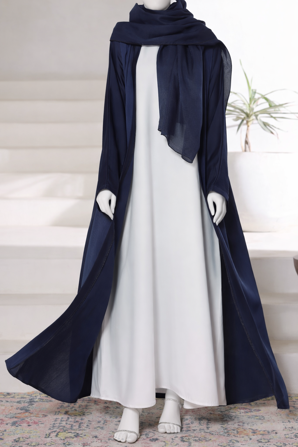 Premium navy abaya gown crafted from imported Romantic Nada fabric, featuring an elegant modest drape with matching dupatta.
