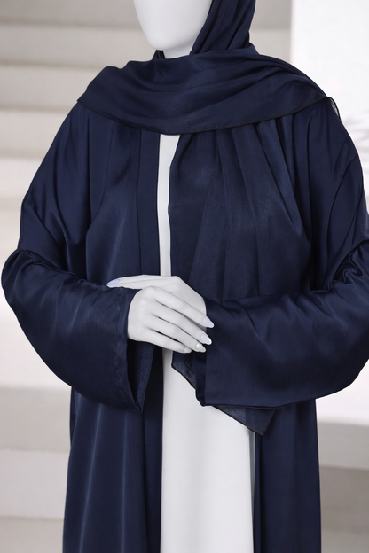 Premium navy abaya gown crafted from imported Romantic Nada fabric, featuring an elegant modest drape with matching dupatta.